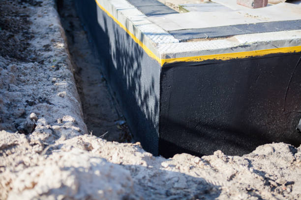 Professional Waterproofing technician working in Millbrook, AL
